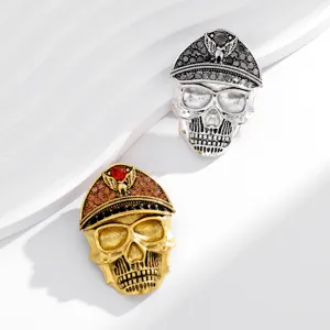 Detailed view of skull brooch, gothic punk style lapel pin, perfect for Halloween party.