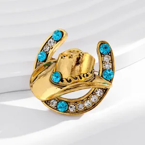 Creative horseshoe cowboy hat brooch with blue and white rhinestones for elegant suit and shirt decor.