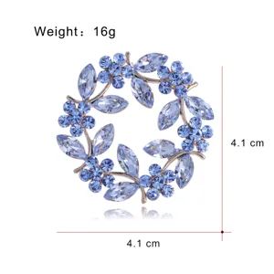 Broche couronne cristal bleu vintage branche d'olivier strass élégant bijoux femme
