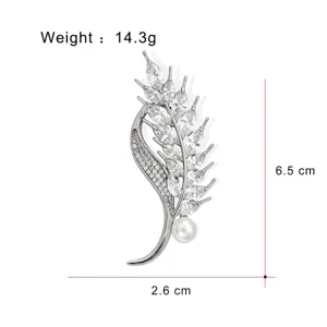 Elegant silver wheat ear brooch with sparkling cubic zirconia and pearl, size 6.5x2.6cm.