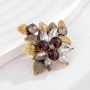 Exquisite vintage crystal flower brooch, detailed close-up shot of elegant floral accessory.