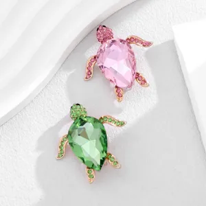 Elegant crystal turtle brooch set featuring sparkling pink and green rhinestones in alloy metal.