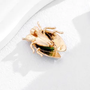 Exquisite Chinese style imitation jade cicada brooch pin, detailed back view design.