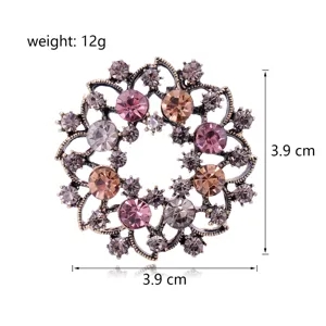 Vintage crystal flower brooch pin for women, elegant alloy rhinestone fashion jewelry.