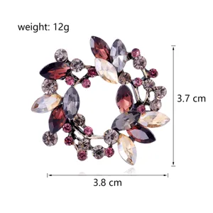 Detailed view of vintage rhinestone floral wreath brooch alloy pin sparkling crystal accessory
