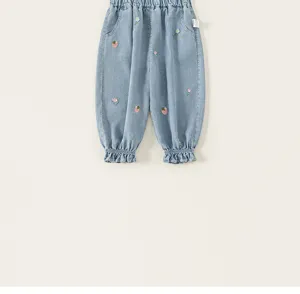 Carini pantaloni di jeans ricamati per bambine, pantaloni azzurri con polsini a volant.