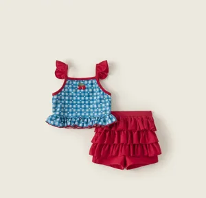 Girls ruffle swimsuit set, blue plaid tank top with cherry embroidery, red shorts.