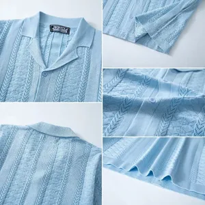 Close-up detail of light blue knitted polo shirt with wheat ear jacquard texture