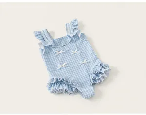 Blue and white gingham toddler girls one-piece swimsuit with cute ruffles and little bows.
