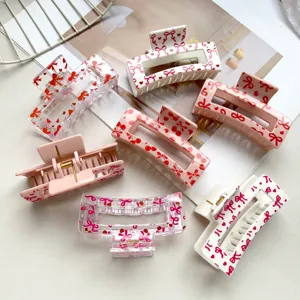 Cute pink bow hair claw clips set, sweet square shark clips for women and girls daily styling.