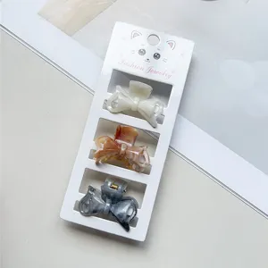 Set di mini mollette per capelli marmorizzate dolci, fermagli a fiocco, accessori eleganti.