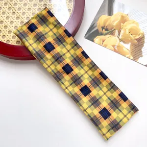 Klassieke gele ruitjes sport hoofdband, veelzijdige elastische haarband voor dagelijks gebruik.