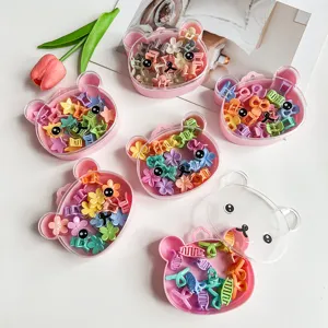 Boîtes de rangement mignonnes en forme d'ours avec pinces à cheveux colorées pour enfants.