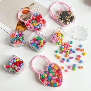 Mini pinces à cheveux mignonnes en set dans des boîtes transparentes, accessoires colorés.