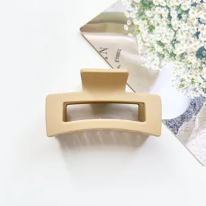 Minimalist matte square hair claw clip in beige, elegant and stylish for daily hair styling.