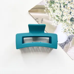 Matte square hair claw clip for women, minimal dark green hair accessory 6.5cm detail view.