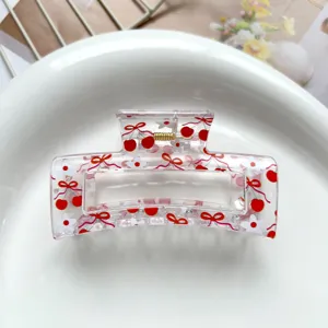 Transparent square hair claw clip with sweet red cherry and bow print for cute daily hairstyles.