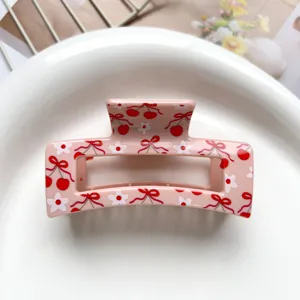 Pink cherry hair claw clip, cute bow hair catch for women and girls daily styling.