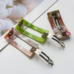 Acrylic marble hair clip detail view, stylish spring barrette for sweet daily hairstyles.
