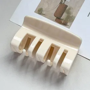 Minimalist cream white hair claw detail, sleek PC material shark clip for women styling.
