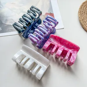 Acrylic marble hair claw clips set, elegant shark clips for thick hair styling and daily wear.