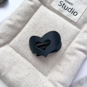 Black matte hollow heart hair claw clip, stylish small hair accessory for daily wear and styling.