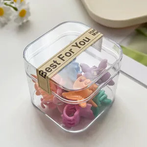 Kinder Mini Haarklammern Set in einer klaren Kunststoffbox, bunte Haaraccessoires.