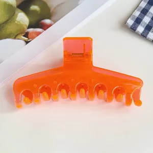 Oranger Gelee Haarclip Detailaufnahme, durchsichtiger Harz Haarklammer für Damen Styling
