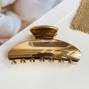 Molla per capelli dorata metallica, elegante pinza a mezzo tondo per acconciature donna.