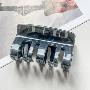 Dark marble hair claw clip for women, stylish acetate hair catch for thick hair and daily styling.