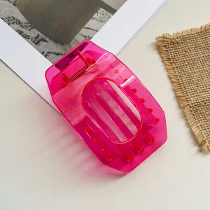 Large pink transparent hollow hair claw clip, chic flat oval geometric shark clip for women.