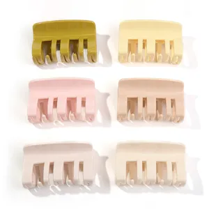 Set of 6 minimalist pastel plastic hair claws, durable jaw clips for women daily styling.