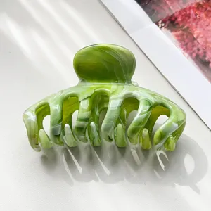 Molletta per capelli marmo verde, elegante accessorio in resina per styling quotidiano e acconciatura.