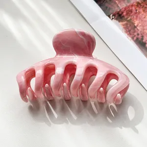 Molla per capelli marmorizzata rosa elegante artiglio di acetato per styling quotidiano.