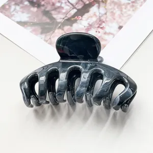 Elegante molletta per capelli in marmo nero, grande pinza per uno styling sicuro e chic.