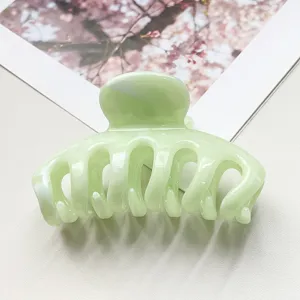 Molla per capelli marmo verde chiaro, elegante accessorio in acetato per acconciatura donna.