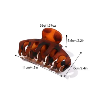 Large tortoise shell hair claw clip for thick hair, glossy PC plastic hair catch accessory.