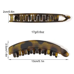 Tortoise shell banana hair clip for women, stylish vertical hair claw for high ponytails.
