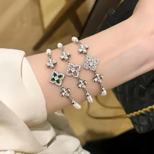 Elegant clover zircon pearl bracelet, French vintage hand jewelry, stunning sparkle for women.