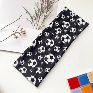 Detailed shot of elastic black and white football pattern sports headband for sports.