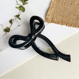 Elegante schwarze Schleifen Haarklammer für Damen, stilvoller Haargreifer für Frisuren.