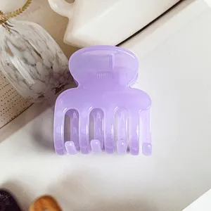 Transparent purple jelly hair claw clip for women elegant daily styling ponytail accessory detail view