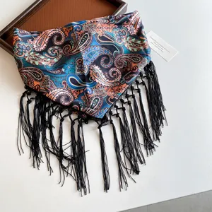 Bohemian paisley triangular silk scarf with chic black fringe, perfect holiday accessory.