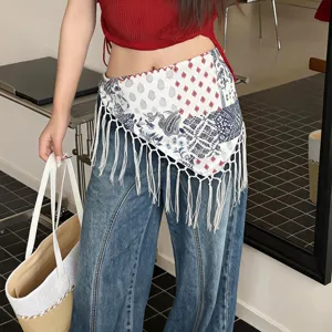 Bohemian paisley triangle scarf with white fringe, stylish waist wrap for women's fashion detail.