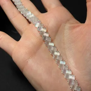 Minimalist square beaded bracelet with iridescent finish, chic light luxury jewelry for women.