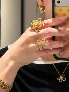 Stunning golden hollow flower zircon open rings and chic jewelry set for women fashion daily wear.