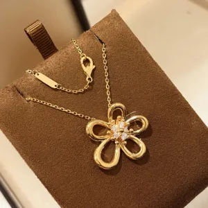 Gold-plated openwork flower pendant necklace with shimmering cubic zirconia center for women.