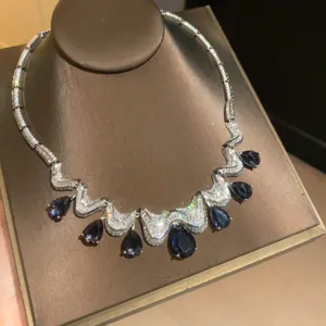 Exquisite teardrop zircon necklace featuring a stunning wave design and sparkling crystal details.