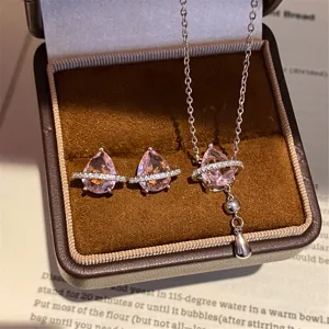 Exquisite pink pear-shaped stone Saturn planet necklace and earrings jewelry set for women.