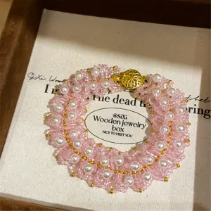 Pulsera de cuentas rosas tejidas de perlas elegante brillante joya de muñeca chic